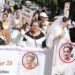 Marchan contra violencia de género en Alto Manhattan a 27 años asesinato dominicana Gladys Ricart